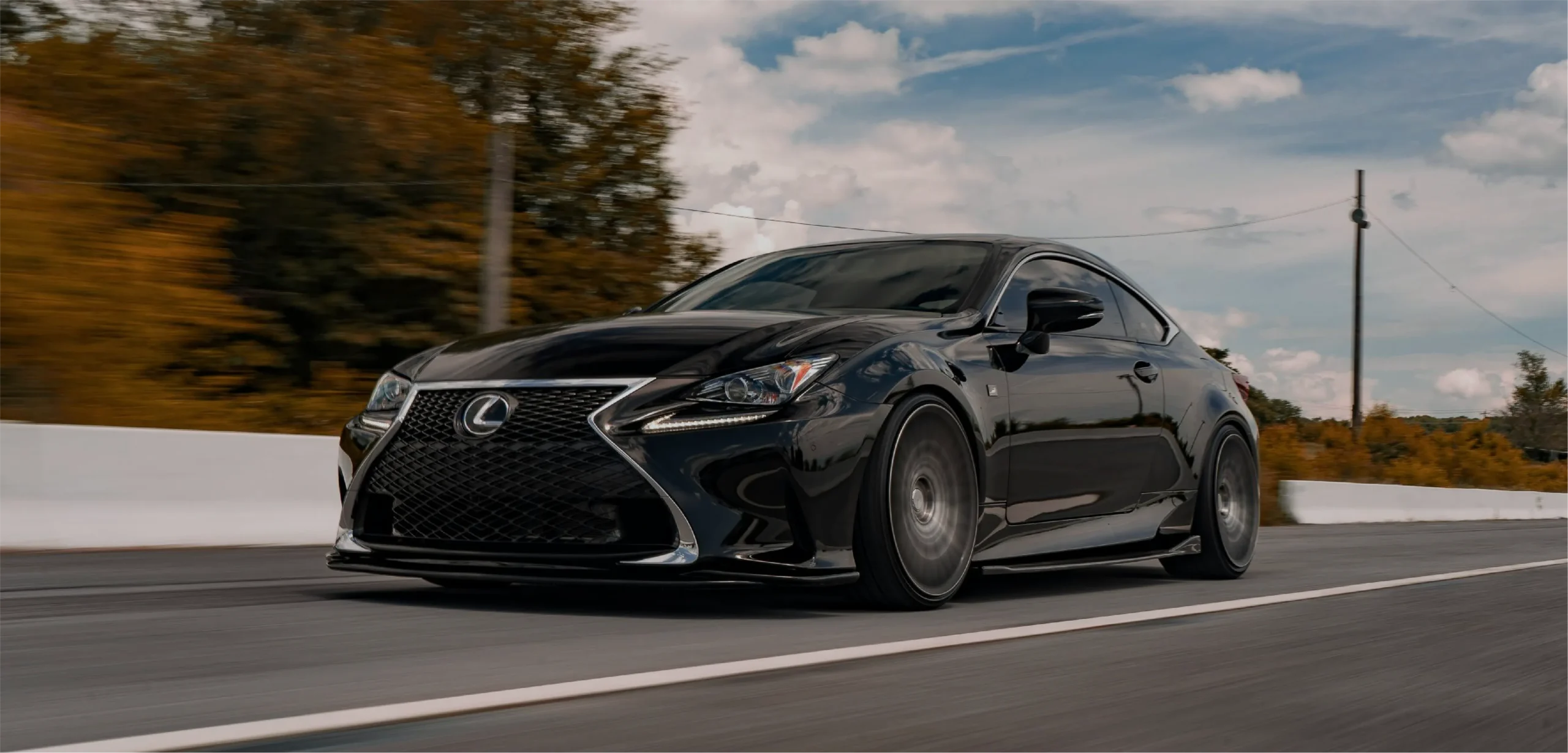webp_Lexus_Header Black Lexus Driving